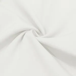 Macro detailopname van zachte witte ademende stoftextuur voor casual herenbroeken