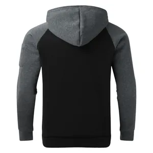 Detailed back view of men's two-tone raglan hoodie featuring black and charcoal grey fabrics
