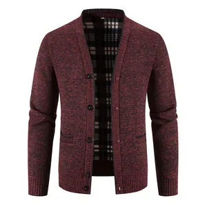 Macro view of men's thick V-neck knitted cardigan with dark red marled texture