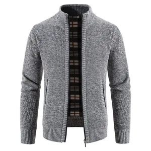 Close-up of a grey men's knitted cardigan showing knit texture and plaid lining details