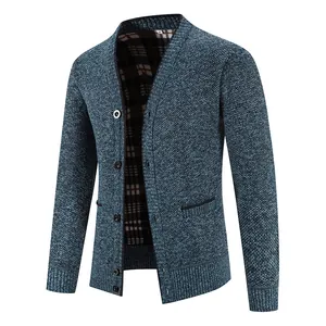 Detailed view of blue knitted men's cardigan sweater with V-neck and button closure