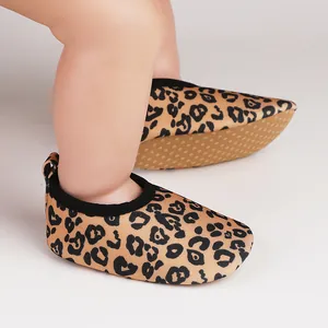 Detailed side view of leopard print infant pre-walker shoes with soft non-slip soles