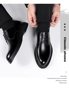 Top-down view of premium men's black leather business formal shoes with elegant laces