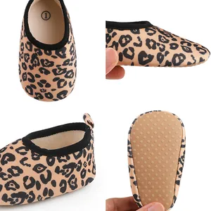 Detailed multi-angle views of leopard print soft-sole baby walker shoes with non-slip grip