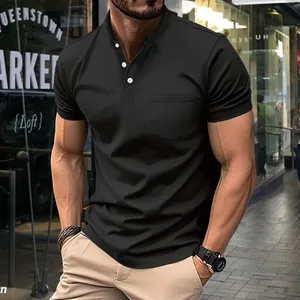 Detailed view of black men's polo shirt with chest pocket and white button closure