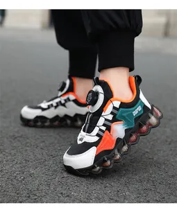 Close-up of colorful children's sneakers with a rotating buckle for easy fastening.