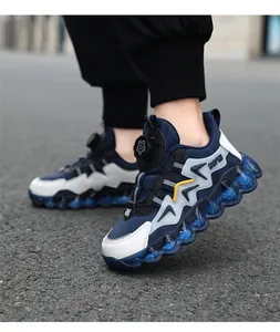 Close-up of children's waterproof sneakers with rotary buckle and bubble sole
