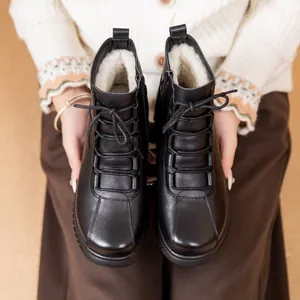 Stivaletti da donna in pelle nera con calda fodera in lana e suola piatta antiscivolo