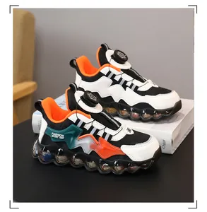Detail view of children's waterproof leather sneakers with swivel buckle and anti-slip sole