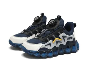 Detailed view of navy blue kids waterproof sneakers featuring a modern rotary buckle