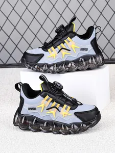 Side detail of waterproof children's sports shoes with rotary buckle and bubble sole