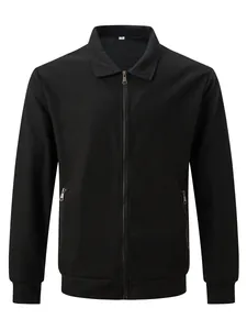 Detail view of a men's black waffle knit zip-up jacket with lapel collar and pockets