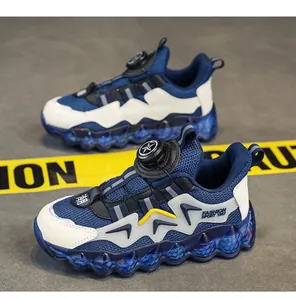 Blue kids sneakers with rotary buckle closure and chunky bubble sole for boys and girls