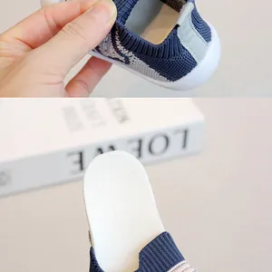 Detail of the breathable knitted upper and soft non-slip sole of toddler sock shoes