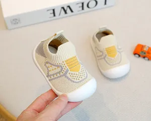Close-up detail of soft-sole fly woven baby walking shoes with non-slip rubber toe cap