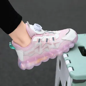Pink children's sports sneakers with quick-release rotary buckle and chunky sole