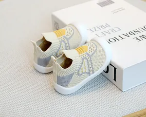 Breathable fly-knit baby floor shoes with non-slip soft rubber soles for toddlers