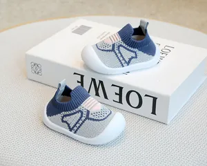 Close-up of breathable knitted baby sock shoes featuring non-slip soft rubber soles