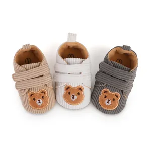 Adorable corduroy infant walking shoes featuring cute bear embroidery in various colors