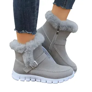 Botas de nieve de invierno grises para mujer con ribete de piel sintética.