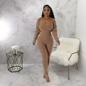 Two-piece ribbed jumpsuit set with U-neck camisole and matching long-sleeved bolero