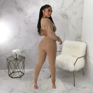 Sexy brown ribbed jumpsuit two-piece set featuring a long sleeve crop top and slim fit
