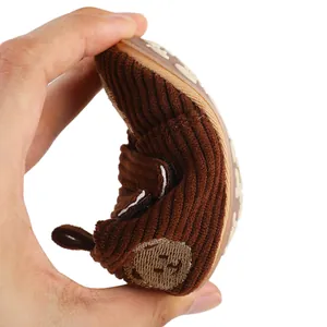 Close-up of flexible soft sole brown corduroy baby walking shoes for infants 0-12 months