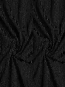 Close-up macro view of black vertical ribbed fabric on elastic men's polo shirt