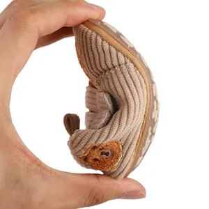 Detail showing the soft flexibility of the cartoon bear baby shoe with rubber sole.