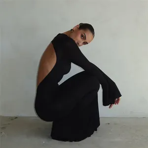 Elegant black backless long sleeve maxi dress with a slim fit and stylish round neck