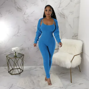Sexy blue ribbed U-neck bodycon jumpsuit and matching shrug two-piece set for women