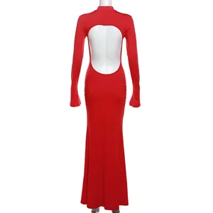 Detailed back view of red long sleeve bodycon maxi dress with circular cutout.