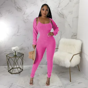 Sexy pink ribbed two-piece bodycon jumpsuit set featuring a matching crop bolero shrug