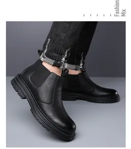 Detailed side view of premium black leather Chelsea boots for men in urban fashion style