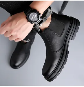 Detailed view of stylish black leather Chelsea boots for men in classic British style