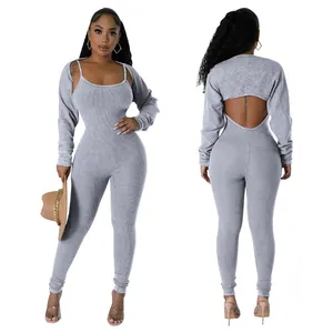 Close-up detail of front and back views showing the ribbed texture of the grey jumpsuit