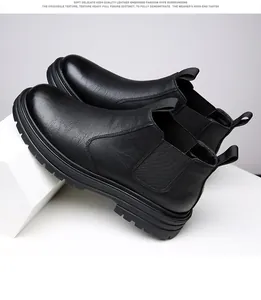 Detailed side view of men's black leather Chelsea boots with premium embossed texture