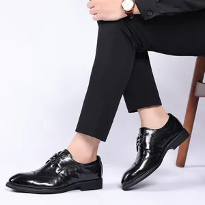 Polished black genuine leather men's business dress shoes with elegant pointed toe design