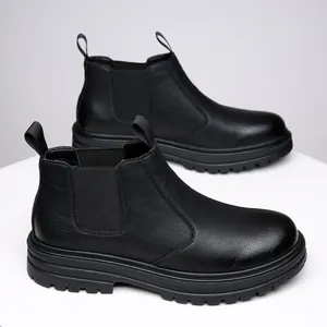 Classic black leather Chelsea boots for men with chunky soles and elastic side panels