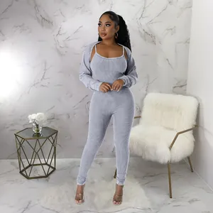 Trendy grey ribbed two-piece set featuring a sexy jumpsuit and matching long sleeve shrug jacket