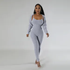 Stylish grey ribbed sexy U-neck jumpsuit paired with a matching long sleeve shrug