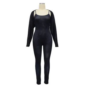 Full view of women's black U-neck tight jumpsuit set with matching shrug