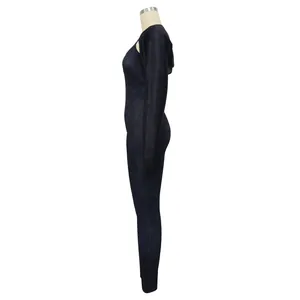 Detailed side view of a black slim-fit long-sleeved jumpsuit on a studio mannequin