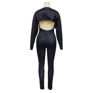 Back view of a sexy black tight jumpsuit set with a matching long-sleeve bolero top