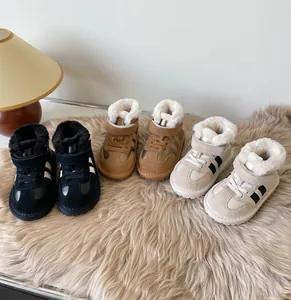 Warm toddler snow boots with plush faux fur lining available in three classic colors