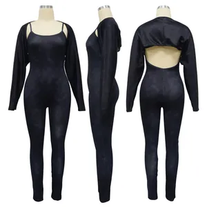 Three-side view of a black ribbed jumpsuit set with spaghetti straps and shrug
