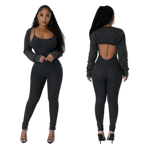 Front and back view of a sexy charcoal grey ribbed U-neck jumpsuit and shrug set