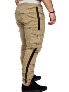 Detailed side view of men's khaki cargo pants featuring black side stripes and pockets