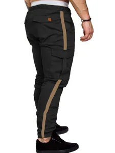 Close-up back view of men's black cargo pants featuring brown side stripes and large pockets