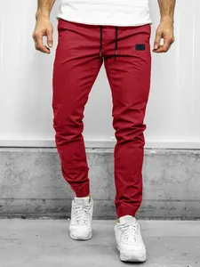 Detailed view of men's red cargo jogger pants with drawstring waist and elastic cuffs